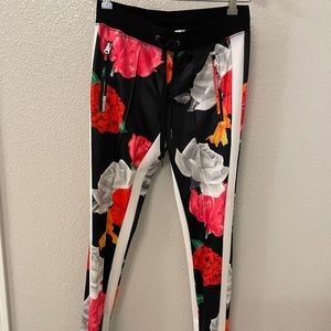PAM & GELA Floral Print Track Pant Size P/Small